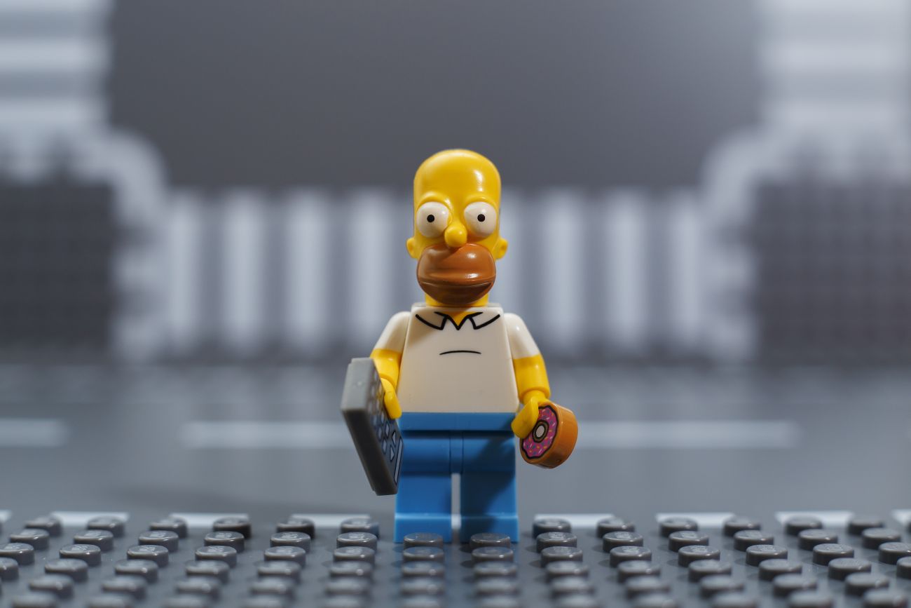 Homer Simpson with Donut and Calculator Homer Simpson with Donut and Calculator