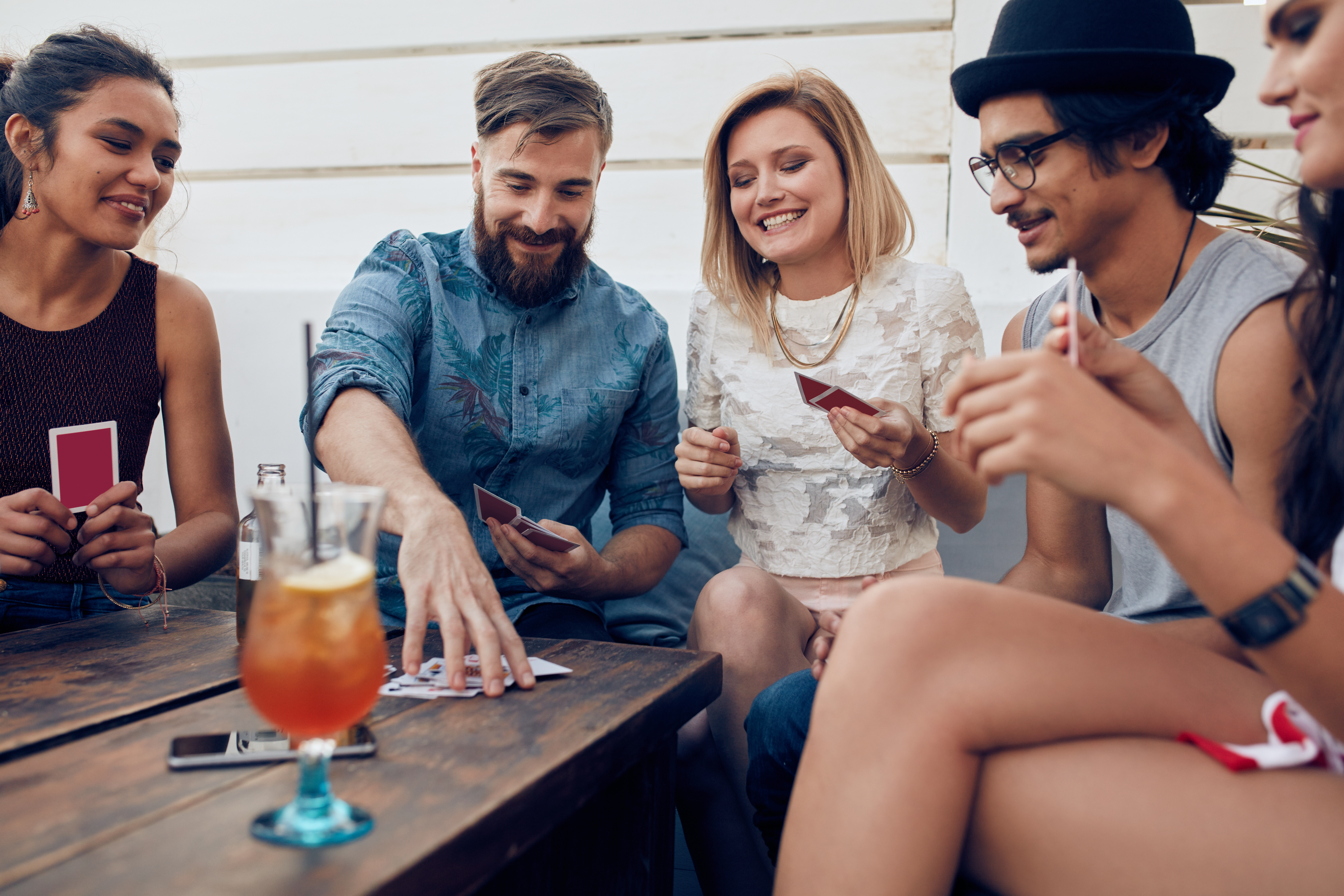 Friends Staying In Having Fun Playing Cards Friends Staying In Having Fun Playing Cards