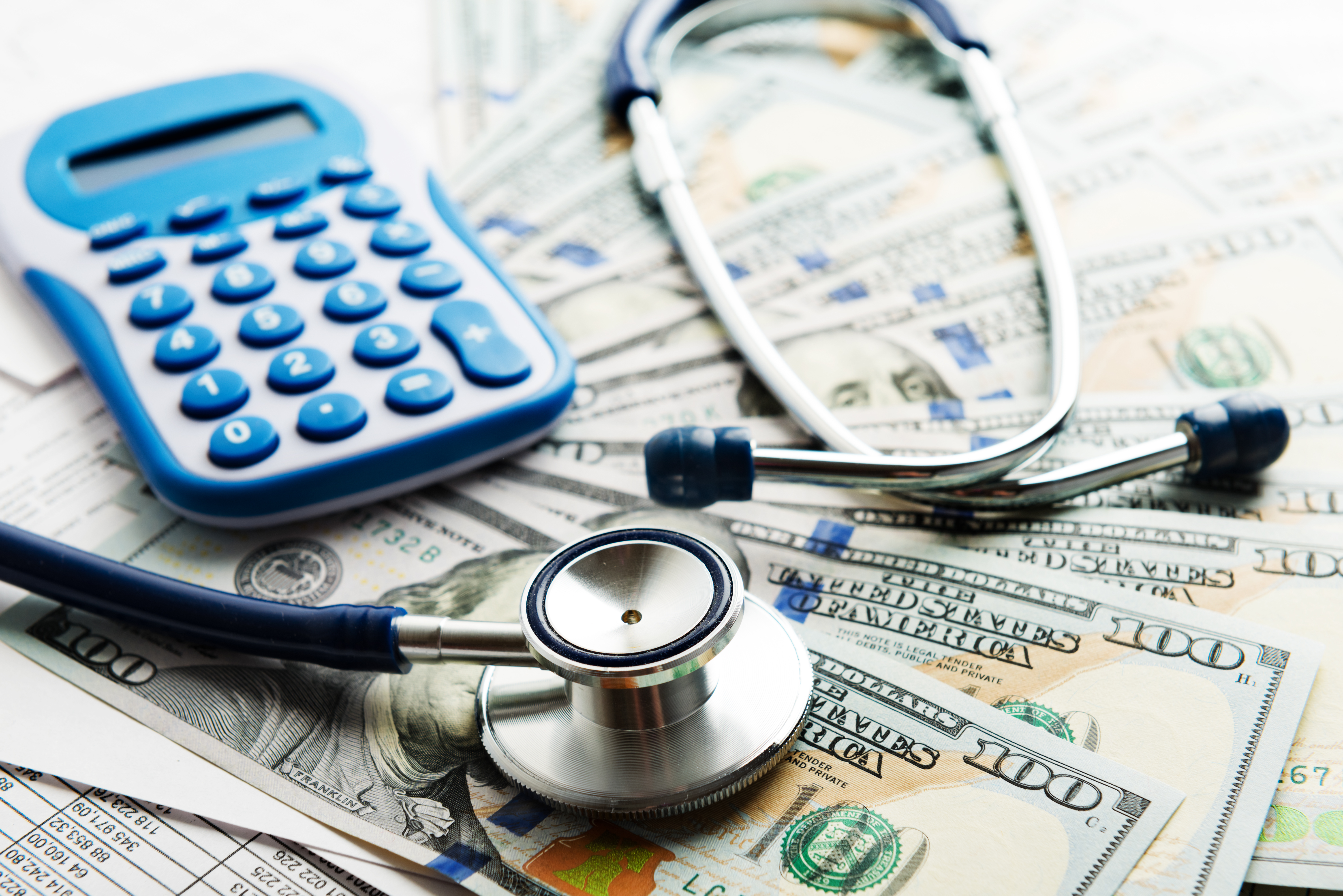 Money with Healthcare Stethoscope & Calculator Money with Healthcare Stethoscope & Calculator