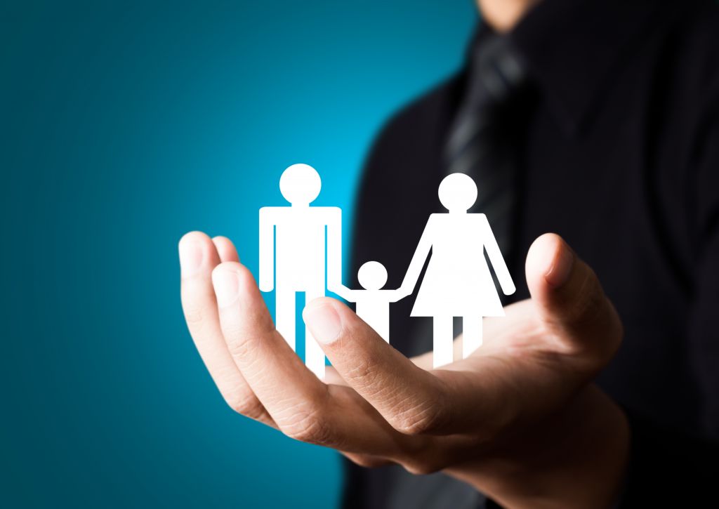 Family Paper Cut Out in Hand Family Paper Cut Out in Hand