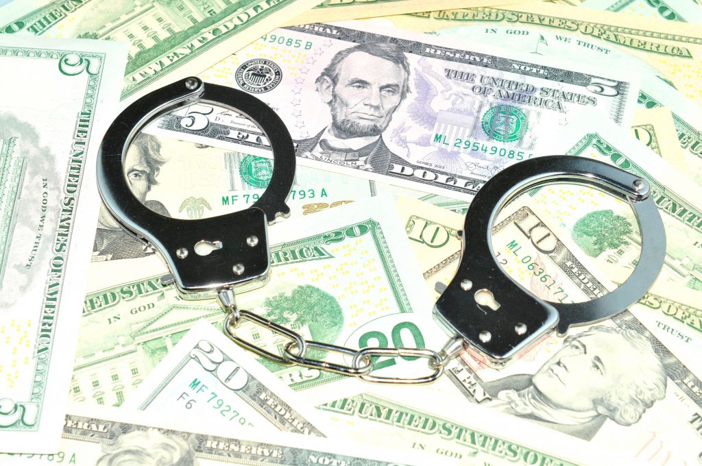 Money with Handcuffs on Top Money with Handcuffs on Top