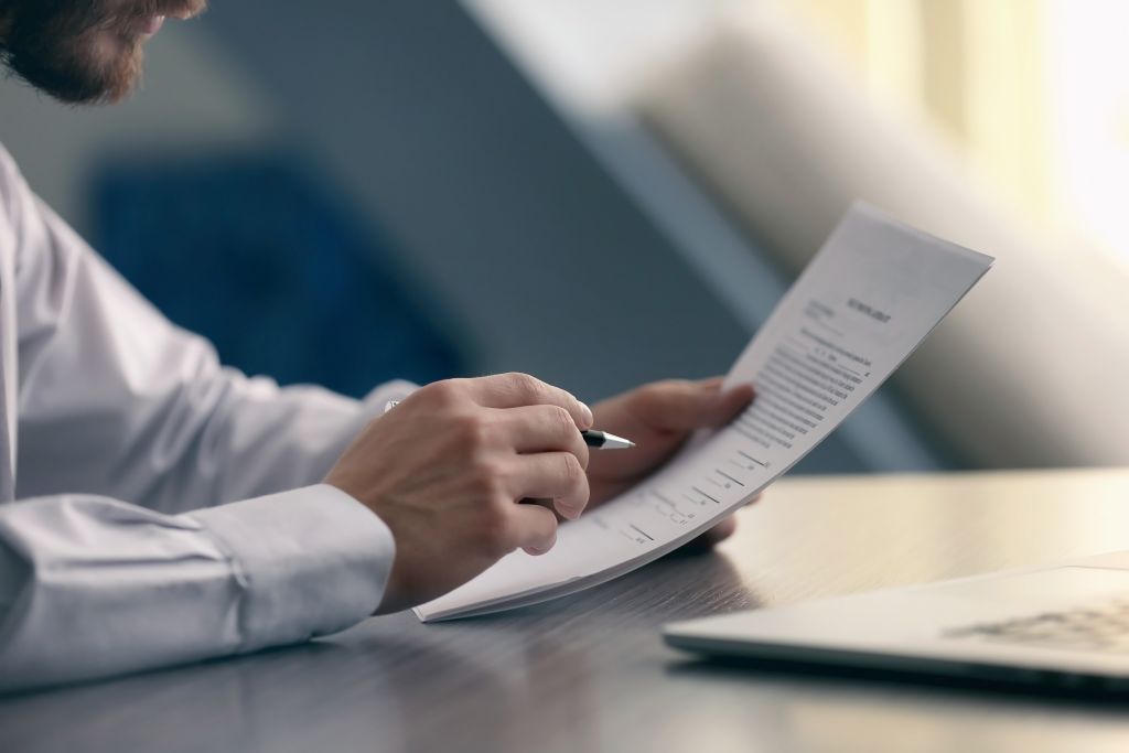 Man Studying Document Man Studying Document