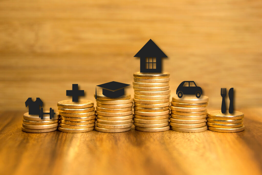Coins Stacked on Table with Loan Type Icons Coins Stacked on Table with Loan Type Icons
