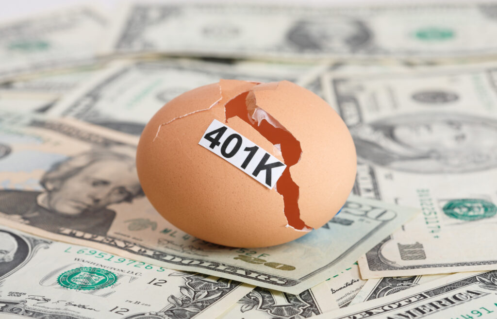 401K Written on Cracked Egg on Cash 401K Written on Cracked Egg on Cash