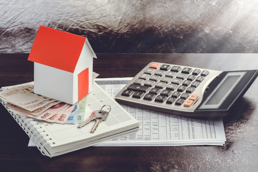 House, Calculator, & Cash on Desktop House, Calculator, & Cash on Desktop