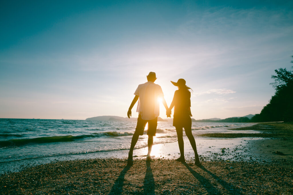 Retiring Couple Enjoying the Beach Retiring Couple Enjoying the Beach