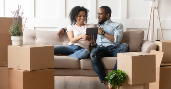 Young couple moving into their first apartment