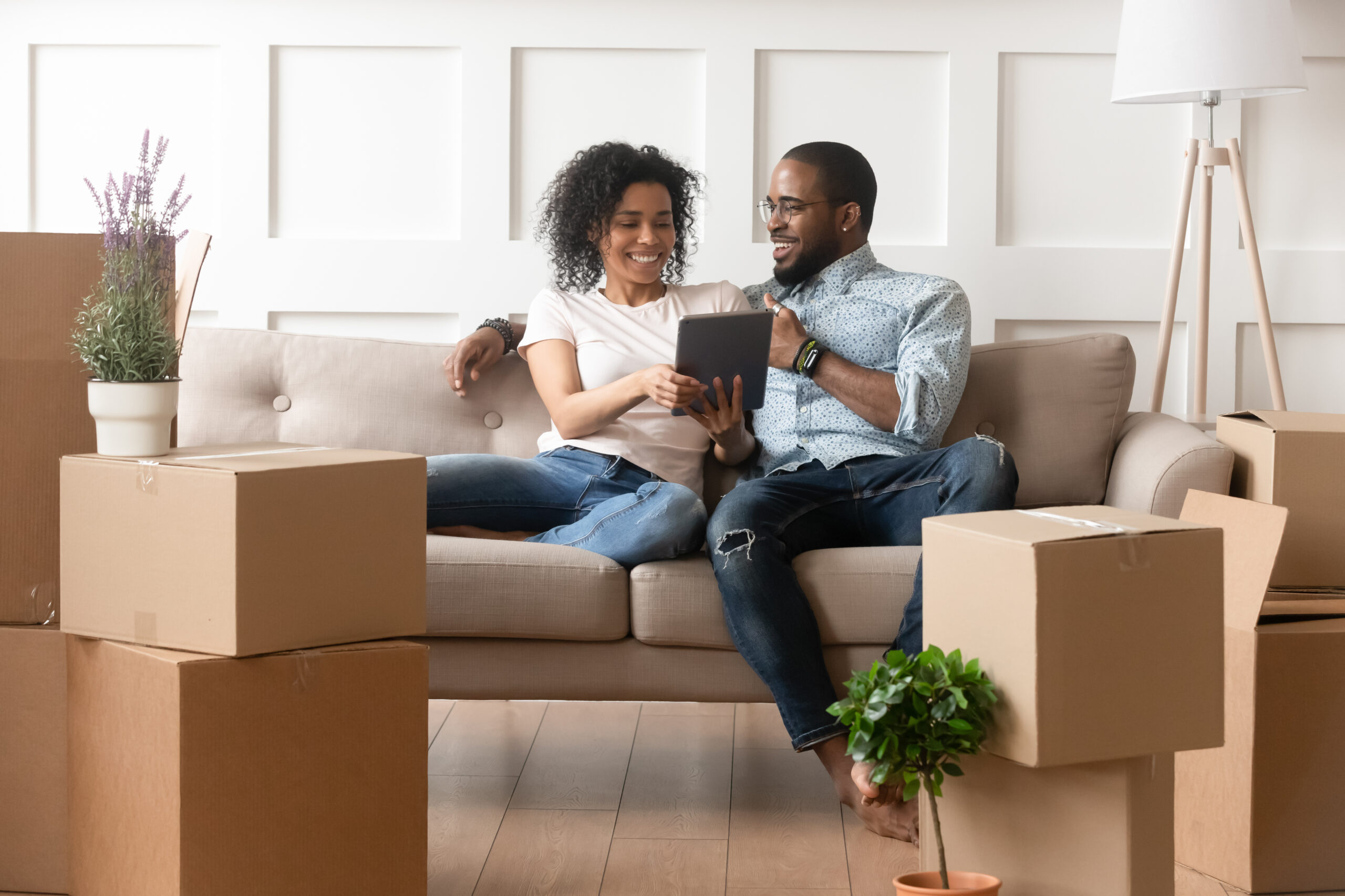 Young couple moving into new house