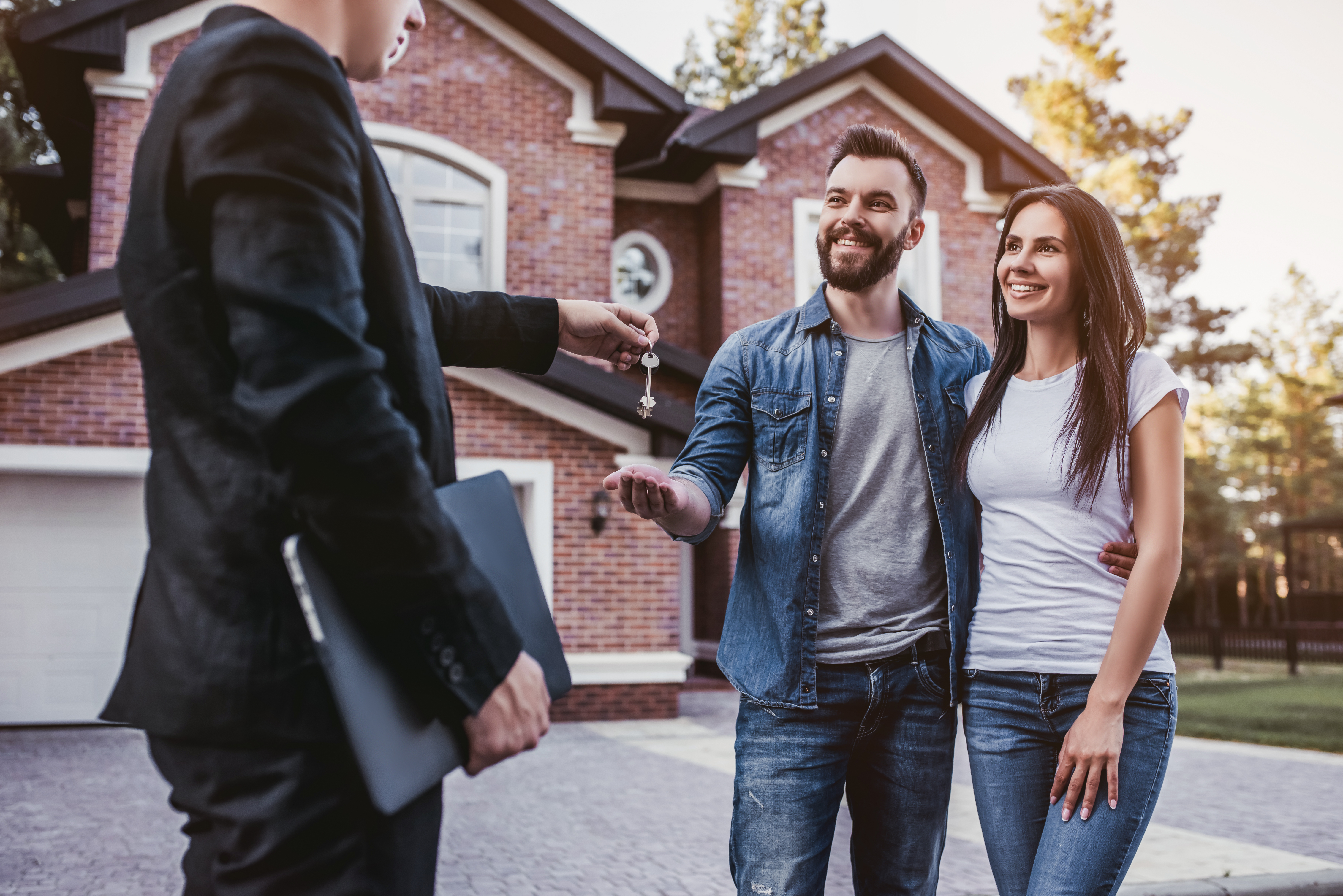 Young couple buying their first house