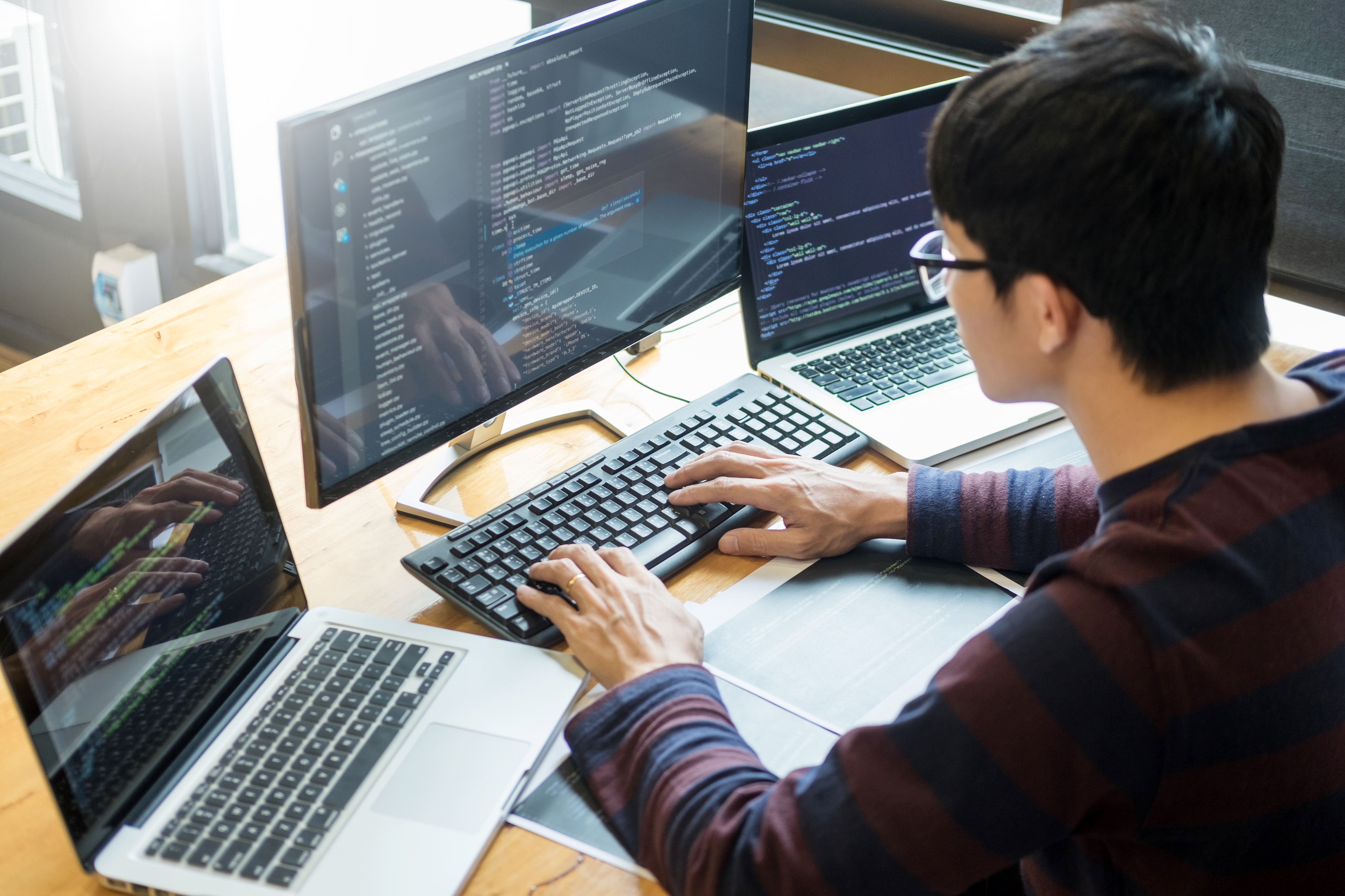Young software engineer working for startup