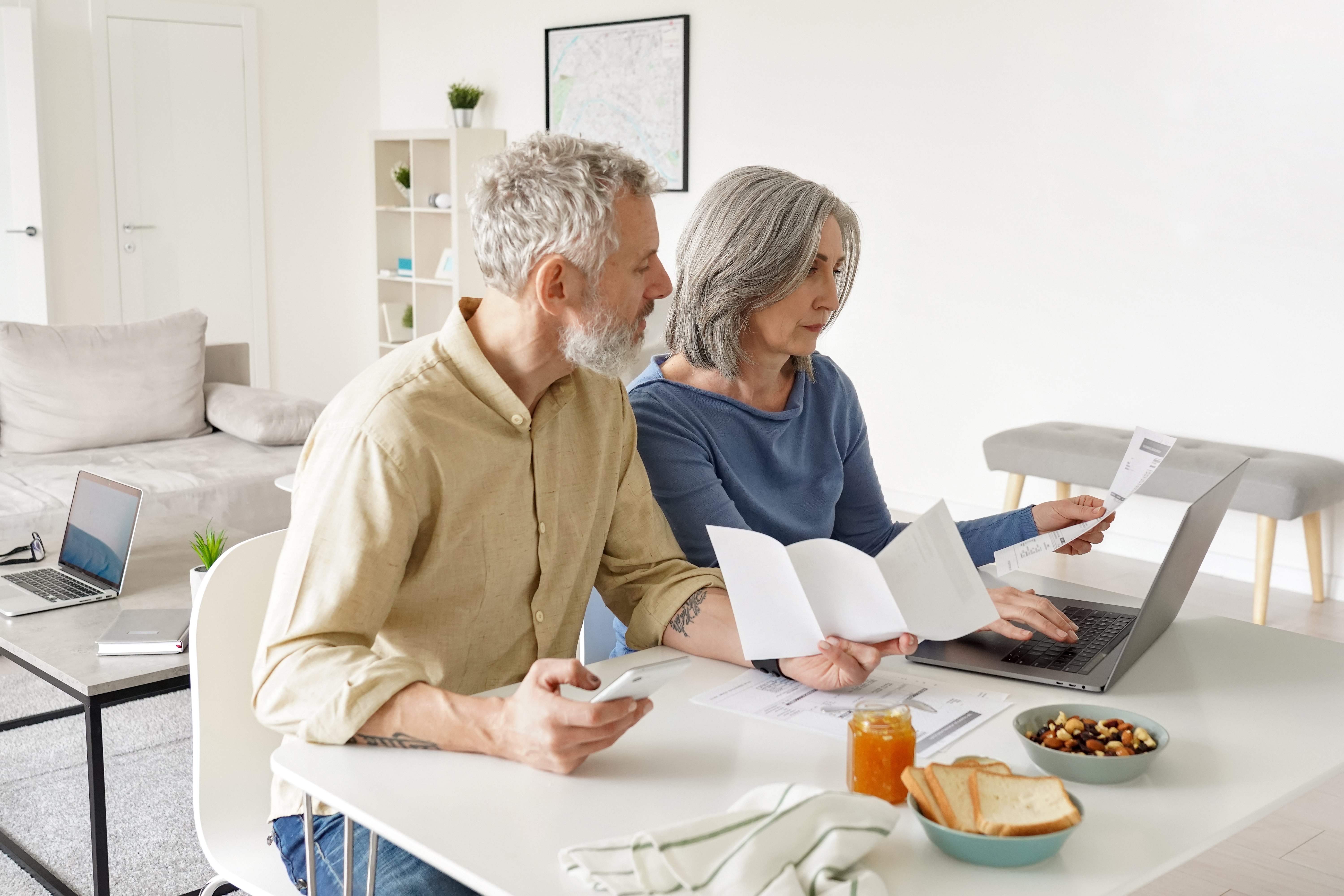 Retired couple looking at their budget