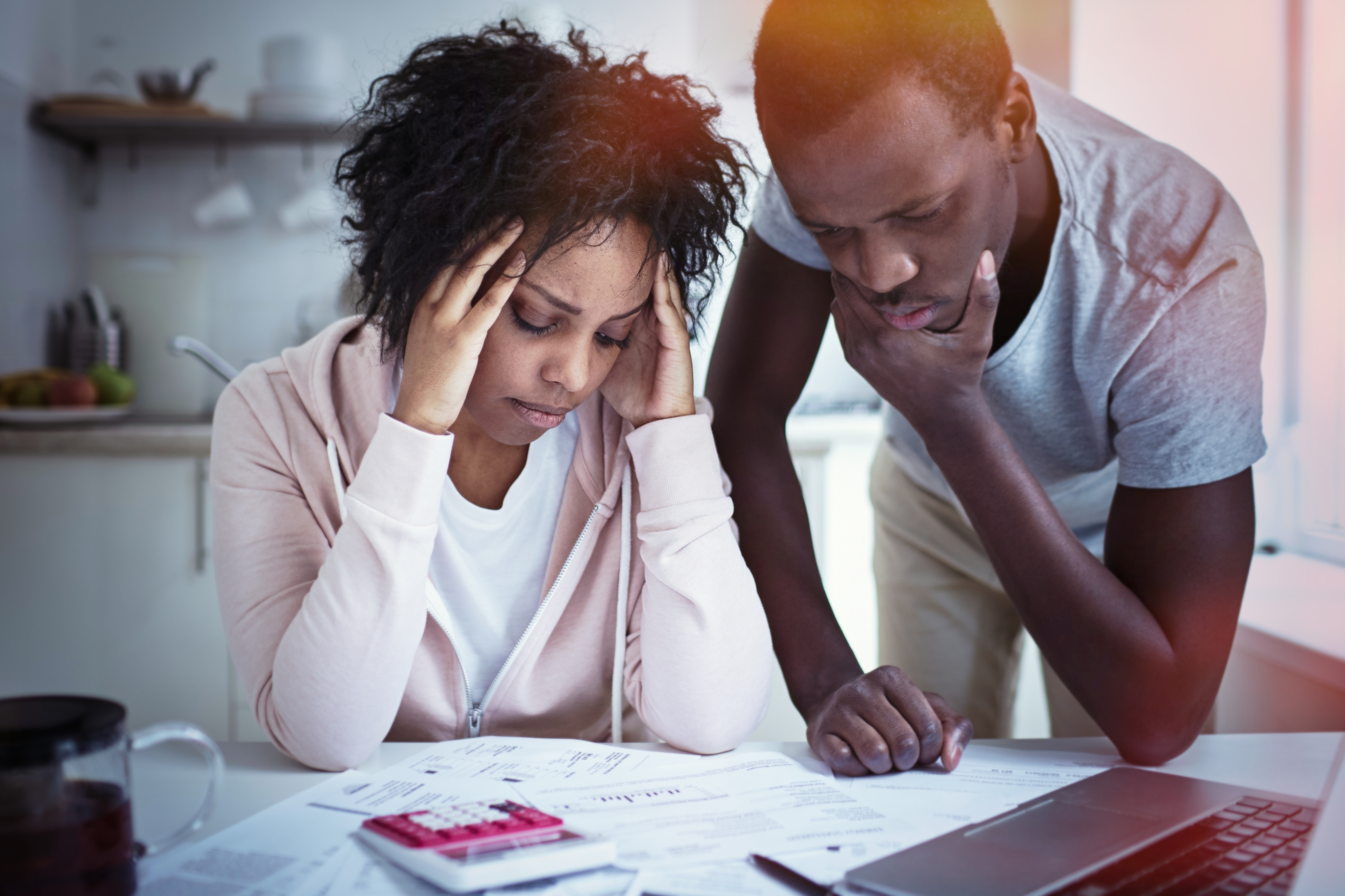 young couple stressed about money