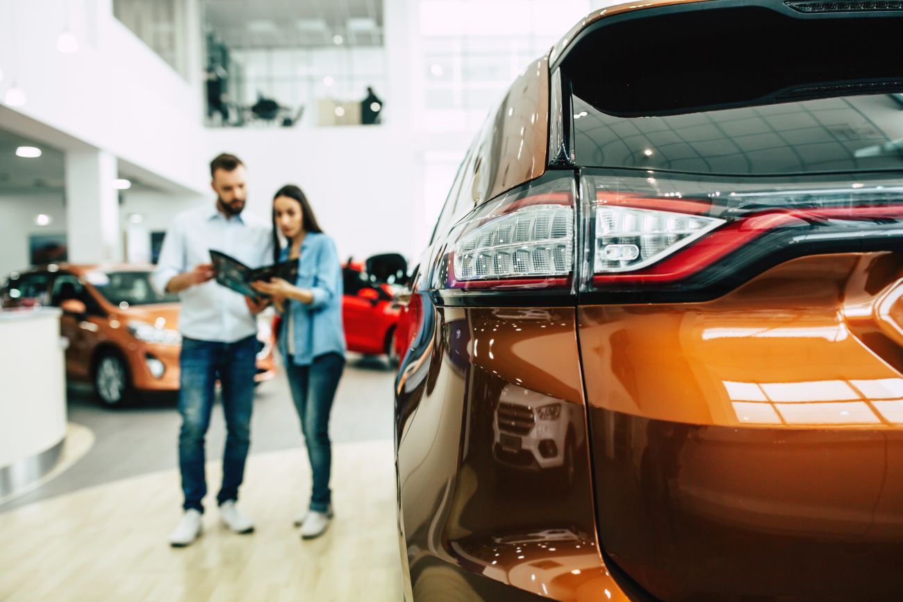 Couple Car Shopping at Dealership Couple Car Shopping at Dealership