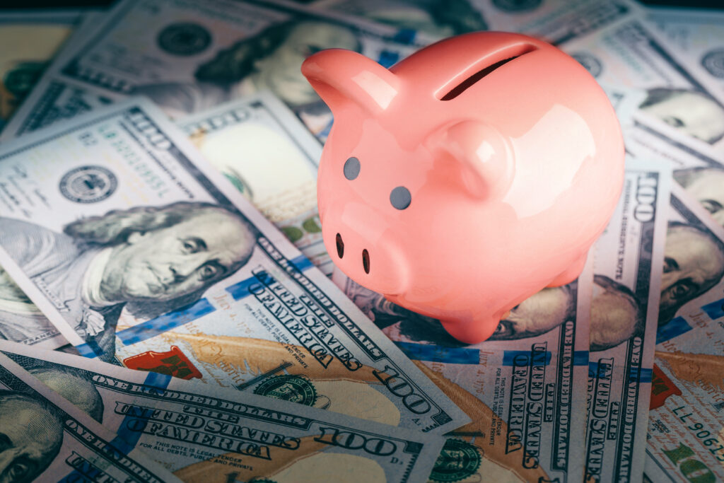 Scattered Cash with Piggy Bank Scattered Cash with Piggy Bank