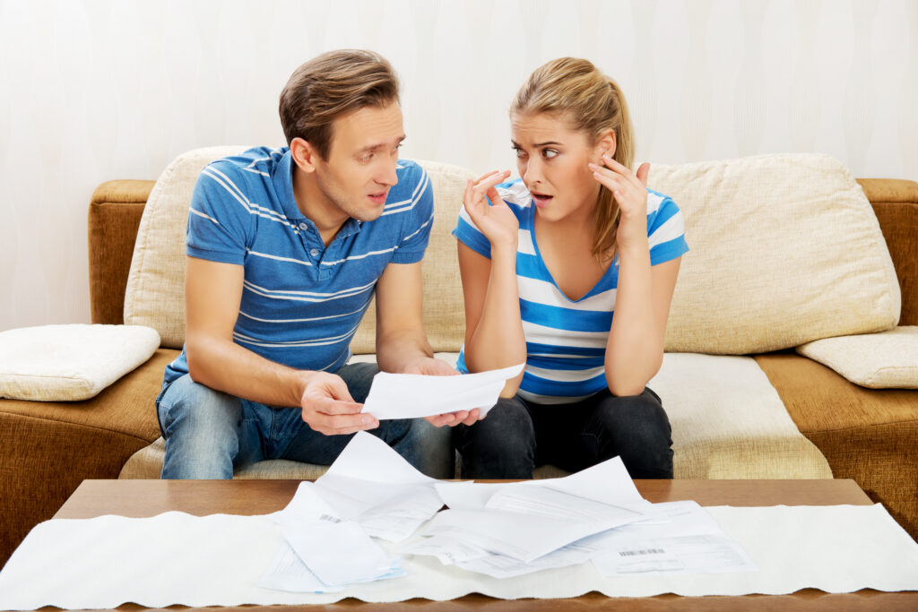 Couple Upset by Finance Documents Couple Upset by Finance Documents