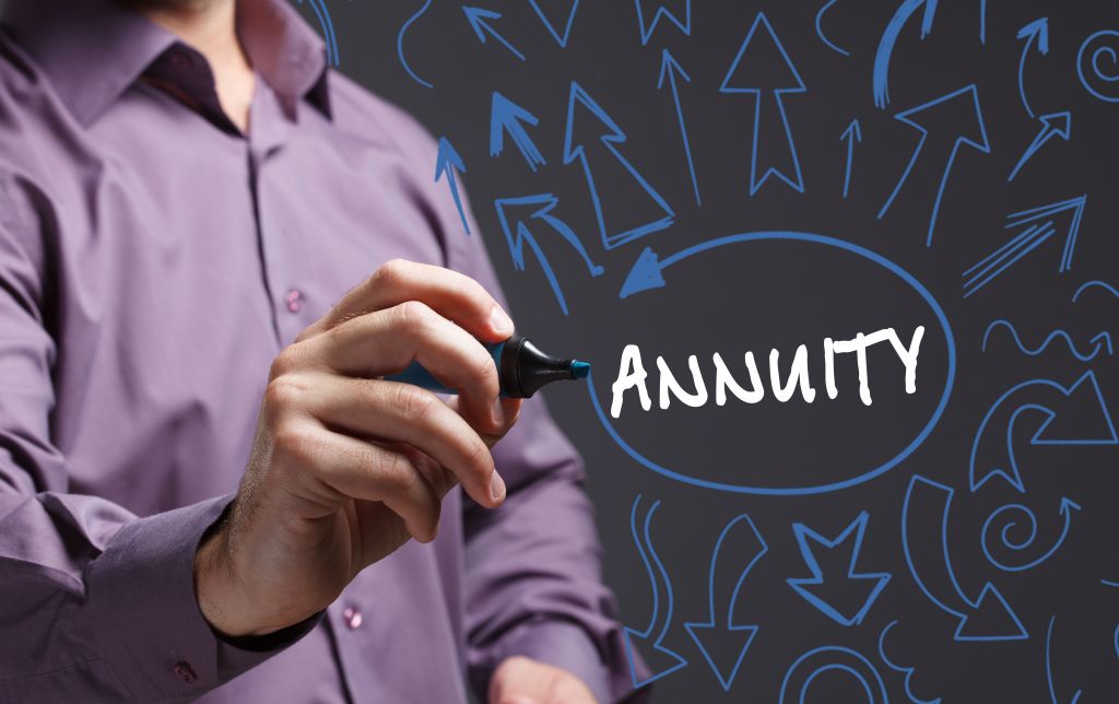 Man Writing Annuity on Clear Screen Man Writing Annuity on Clear Screen