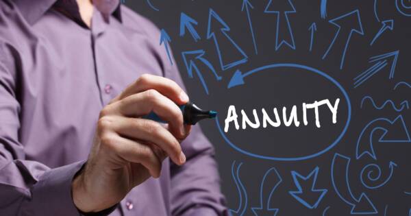 Man Writing Annuity on Clear Screen