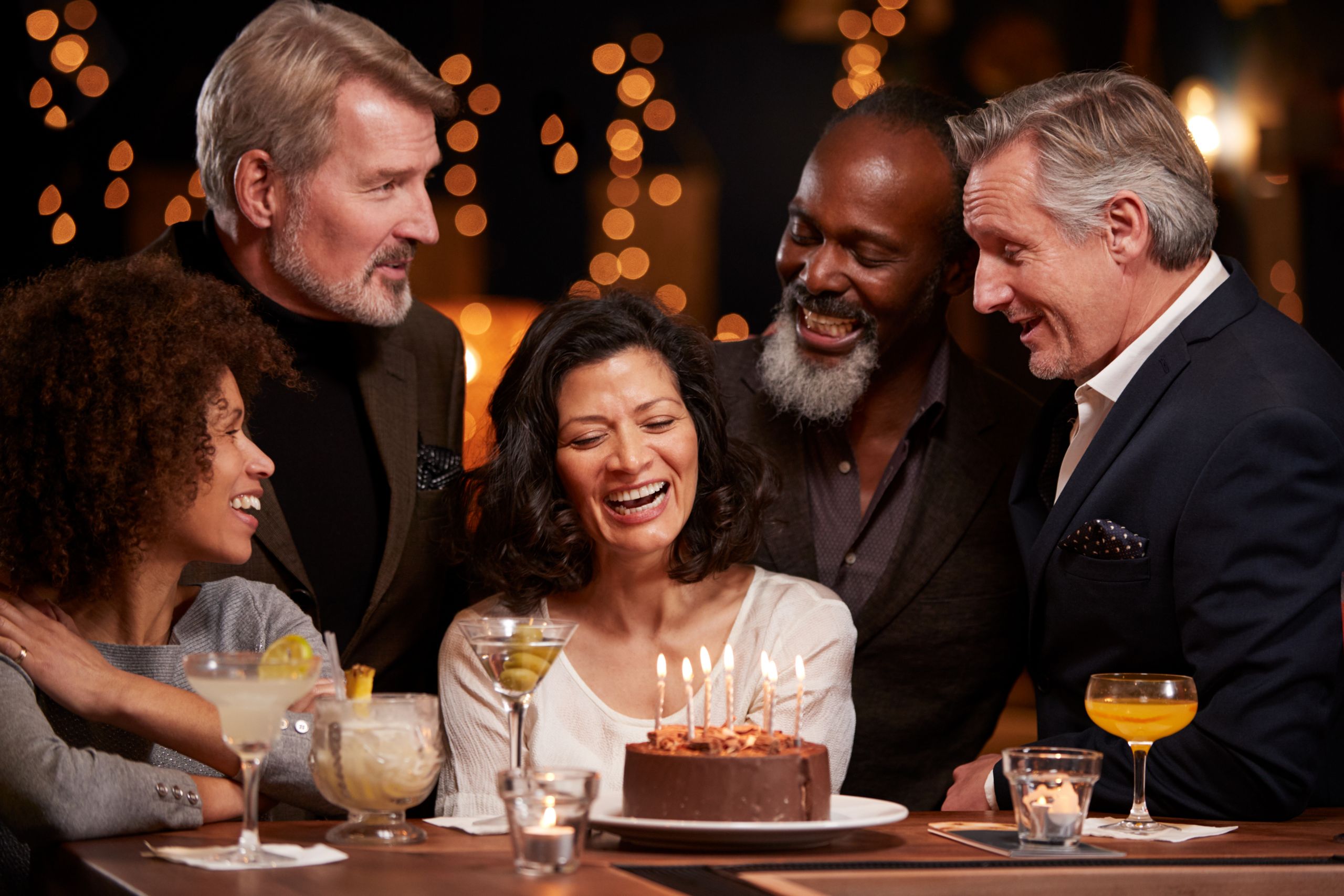 Woman Celebrating 40th Birthday with Friends Woman Celebrating 40th Birthday with Friends