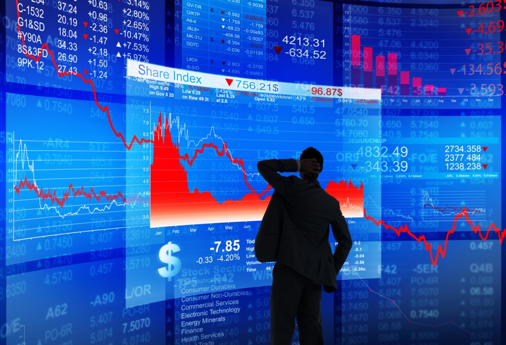 Man Watching Blue and Red Stock Chart Man Watching Blue and Red Stock Chart
