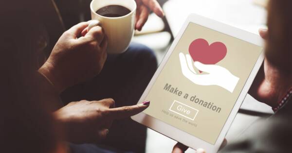 Donating on Tablet at Coffee Shop