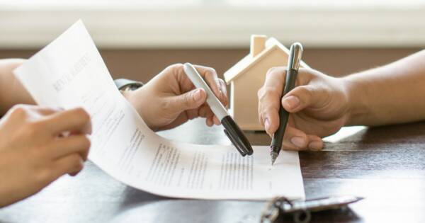 Signing Mortgage Renewal Agreement