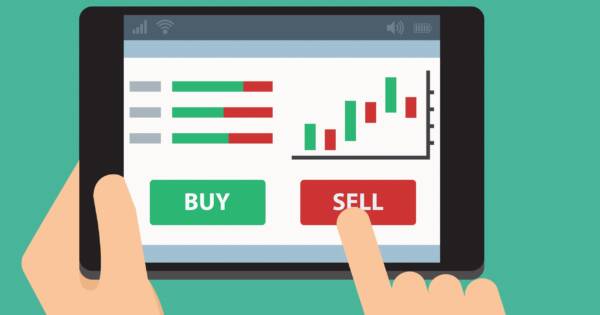 Hand Clicking Sell on Tablet Computer