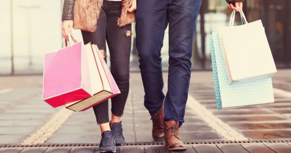 Couple with Shopping Bags at Retailer