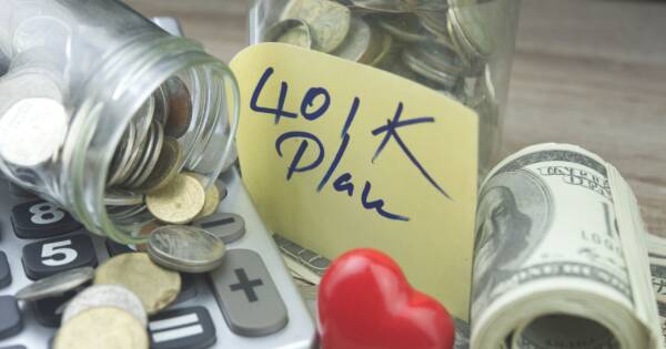 401K Savings Coin Jar and Money Stack