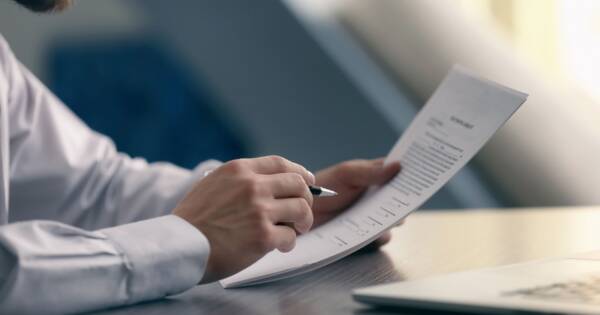 Man Studying Document