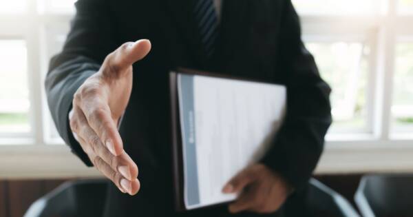Business Man Offering Hand Shake