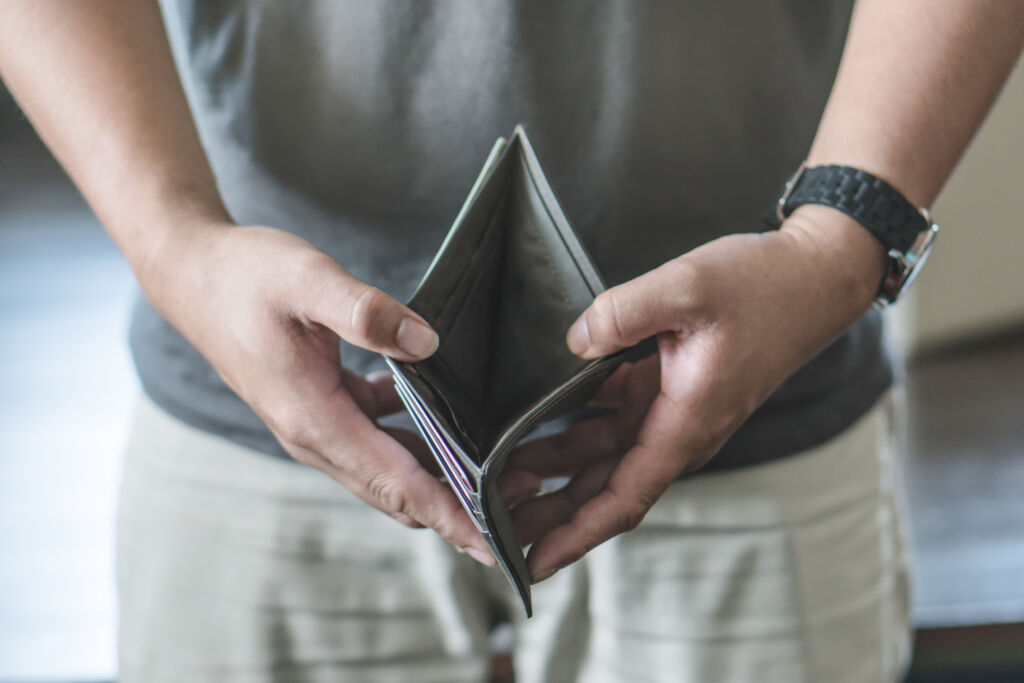 Man Opening Empty Wallet Man Opening Empty Wallet