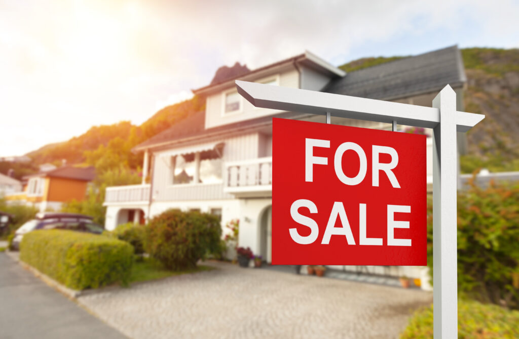 House with Red For Sale Sign House with Red For Sale Sign