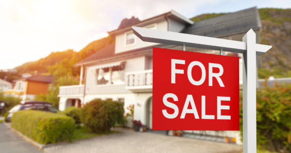 House with Red For Sale Sign