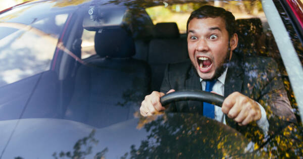 Guy Yelling Driving Car
