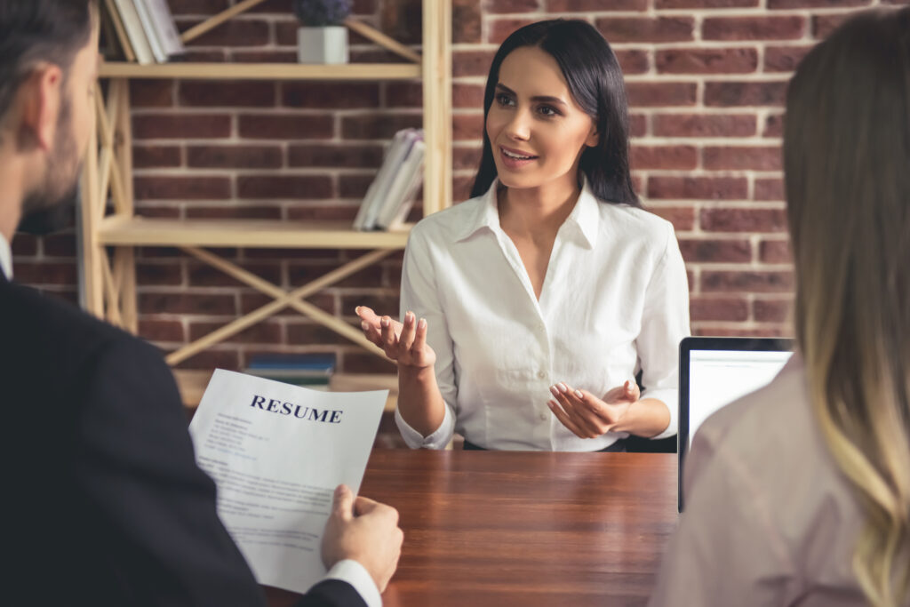 Woman Talking in Job Interview Woman Talking in Job Interview