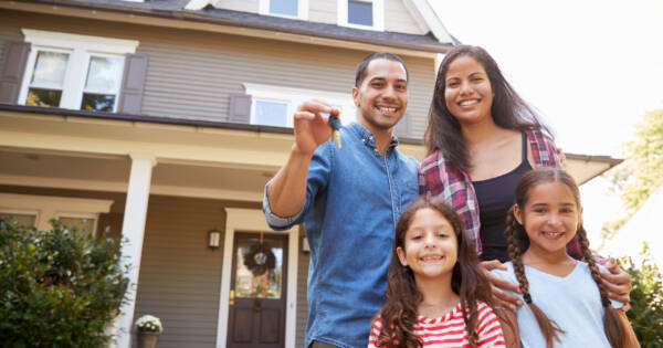 Happy Family with Keys to New Home