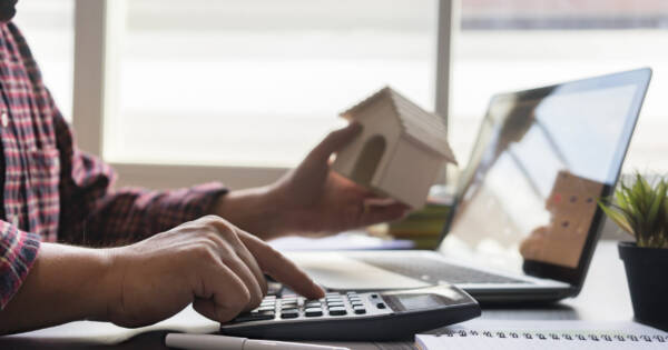 Man Calculating Mortgage