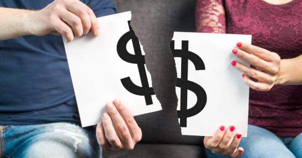 Couple with Money Sign Ripped in Half