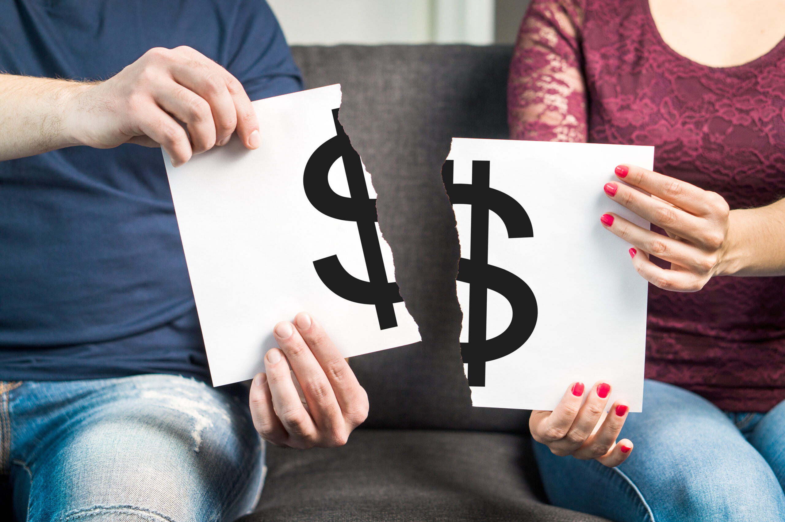 Couple with Money Sign Ripped in Half Couple with Money Sign Ripped in Half