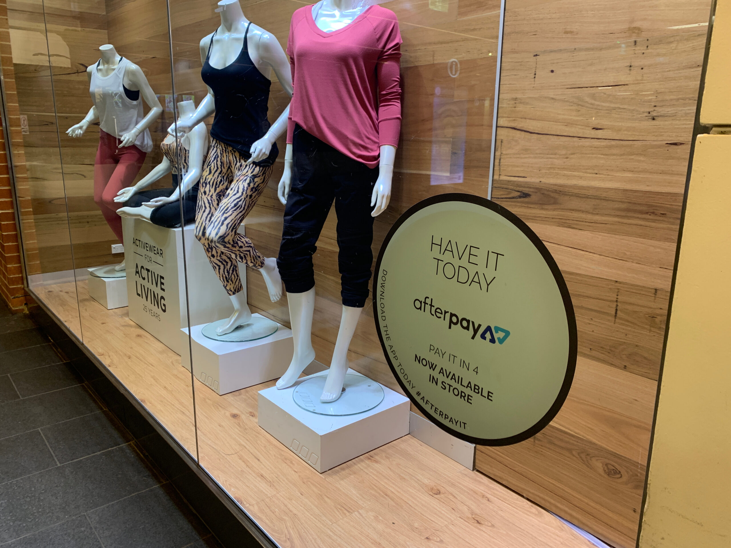 Store Display Window with Buy Now Pay Later Sign Store Display Window with Buy Now Pay Later Sign