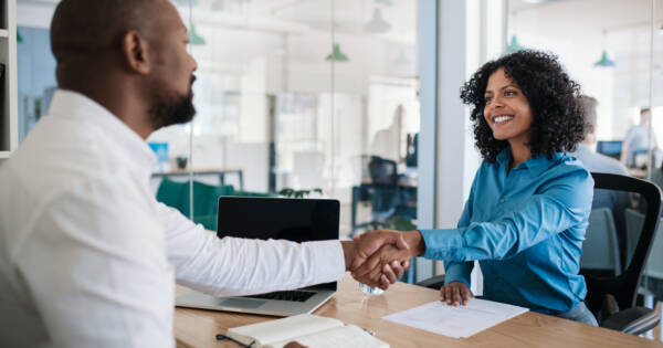 Young woman meeting with her boss