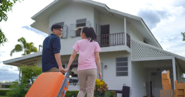 Young couple moving into their first house