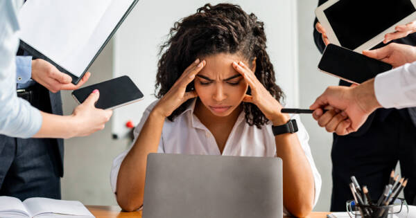 Woman stressed from overworking
