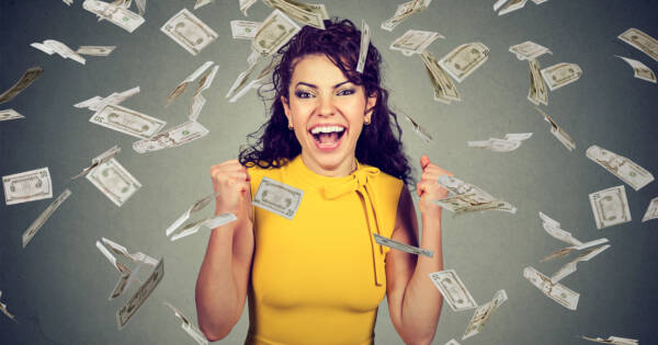 Woman enjoying a sudden windfall of money