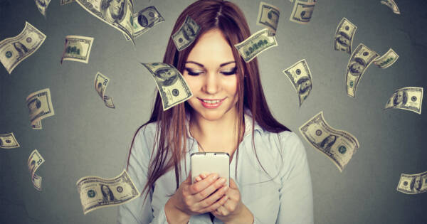 Young woman spending money on social media